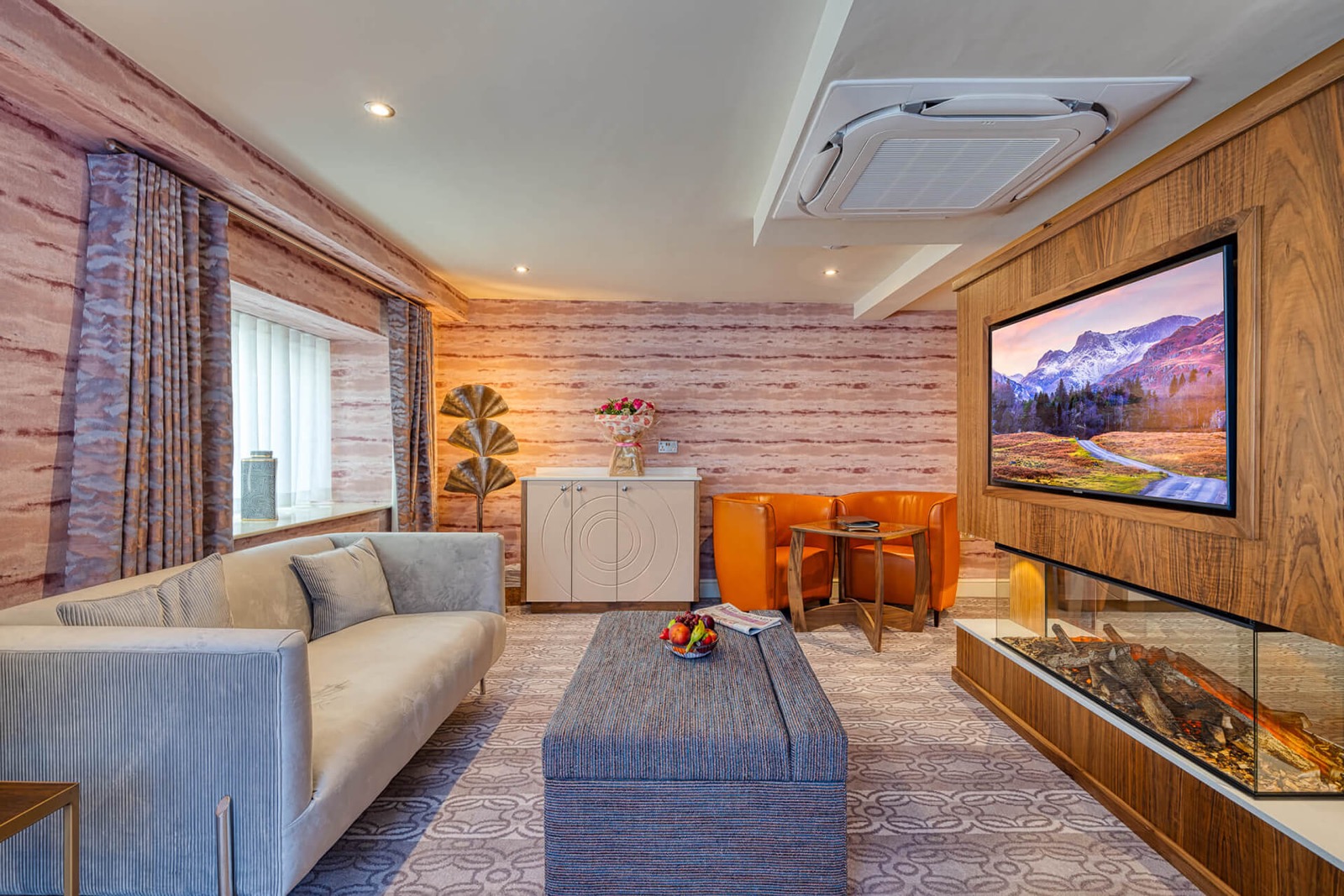 Olive Mews lounge fireplace and tv