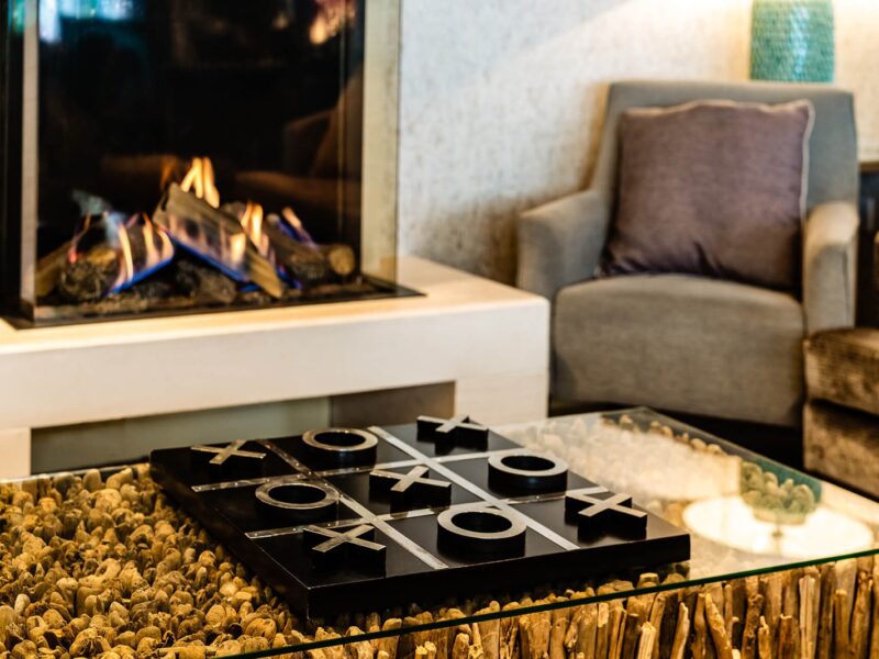 Hotel Lounge games board and electric fire
