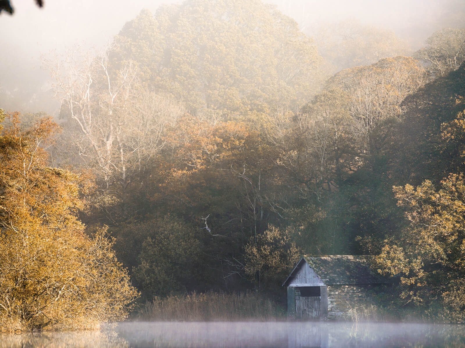 mist on the water at rydal boat house